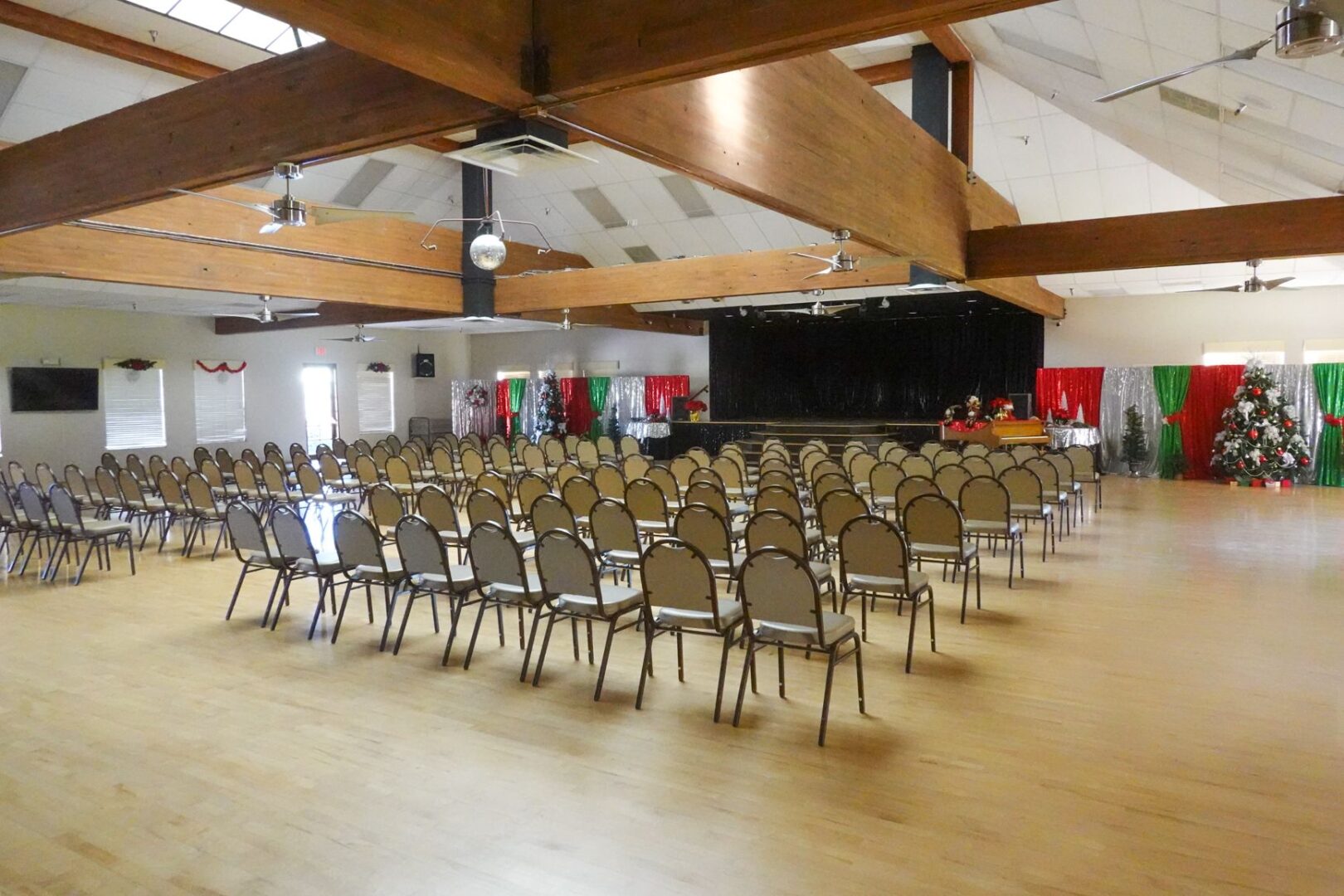 A large room filled with chairs and tables.